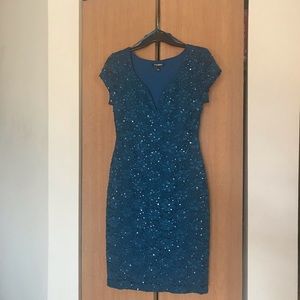 Teal glittery lace pattern